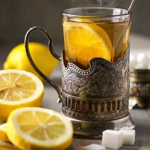 Postcard hot tea with lemon