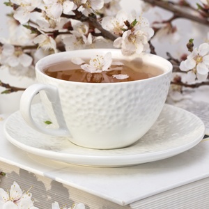 Pocztówka herbata z kwiatem wiśni